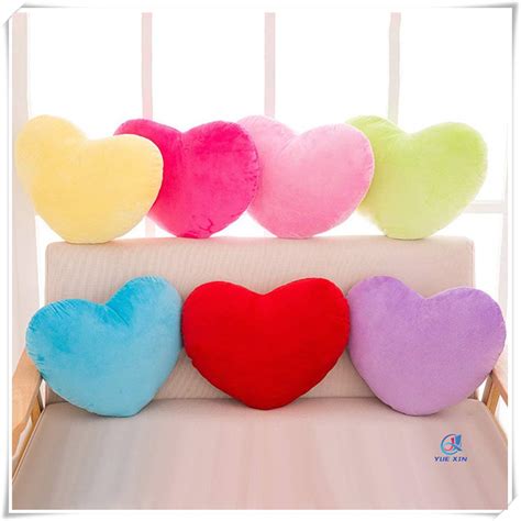 Transform Your Bedroom into a Whimsical Wonderland with Teal Heart Pillows